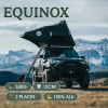 La tente de toit Equinox devant une montagne