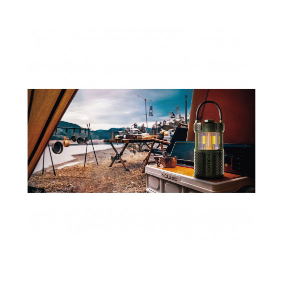 Lampe enceinte Follow Light F1 Now:Go posée sur une table de camping en extérieur, éclairage allumé